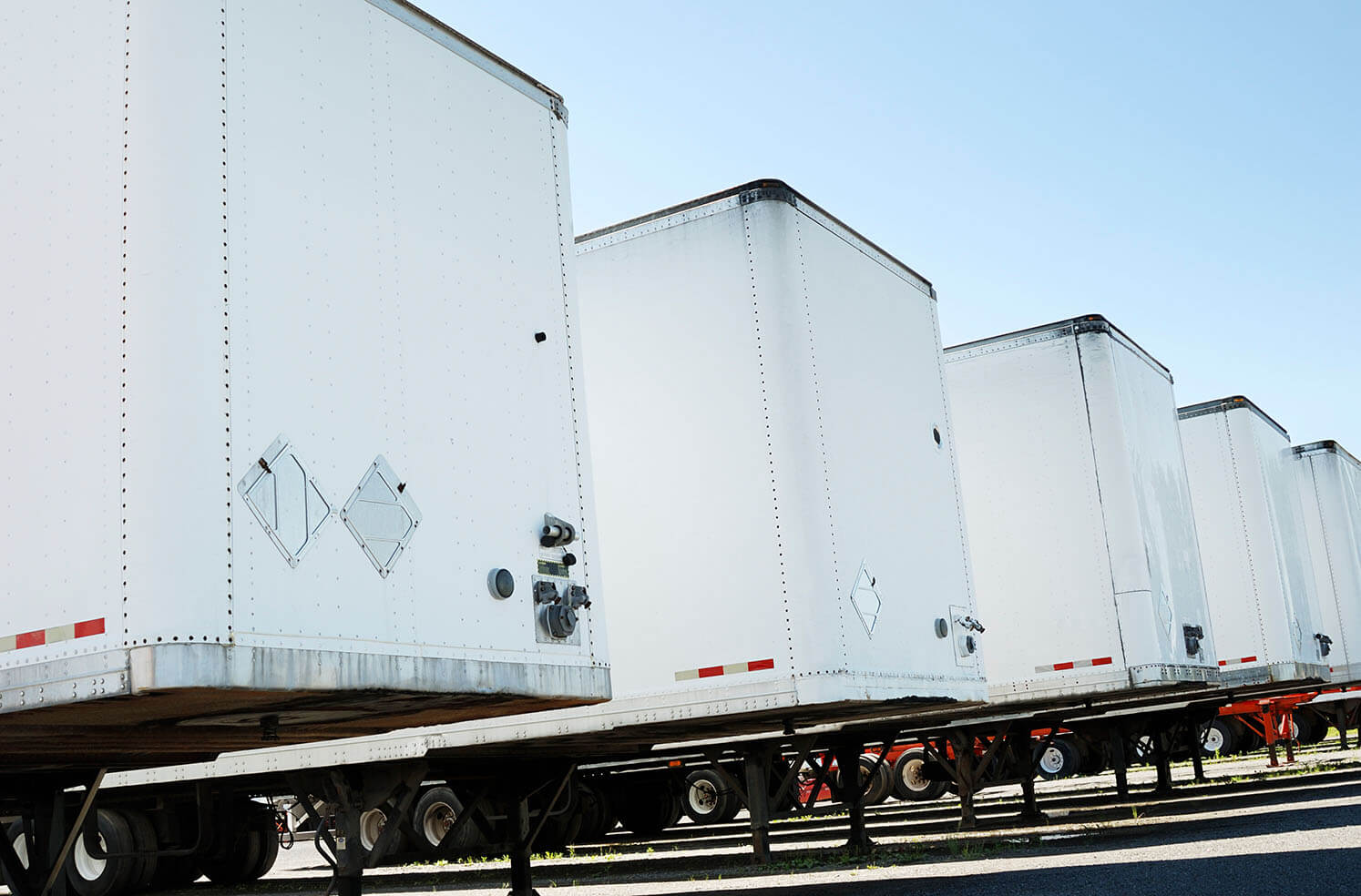 Dry van semi trailers in a line