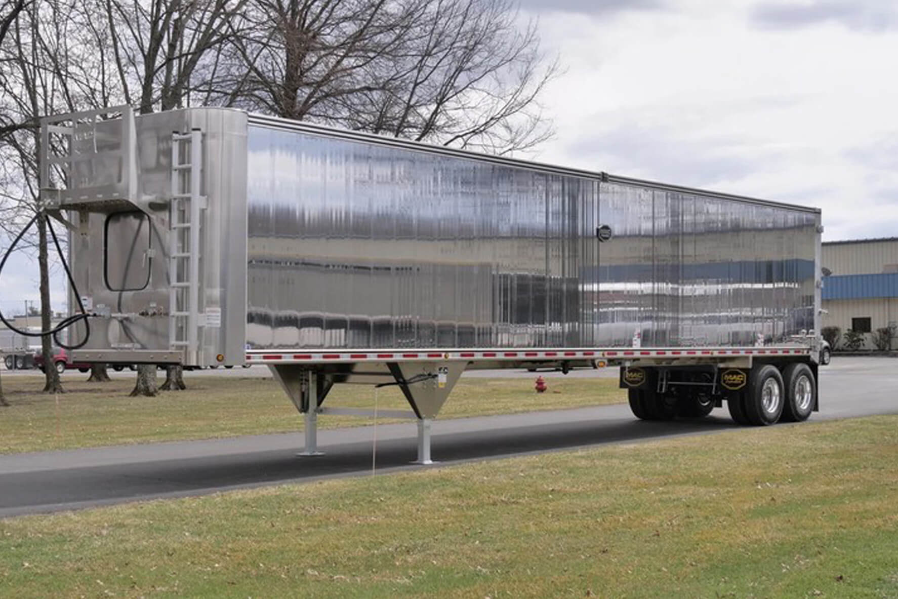 A silver semi parked outside